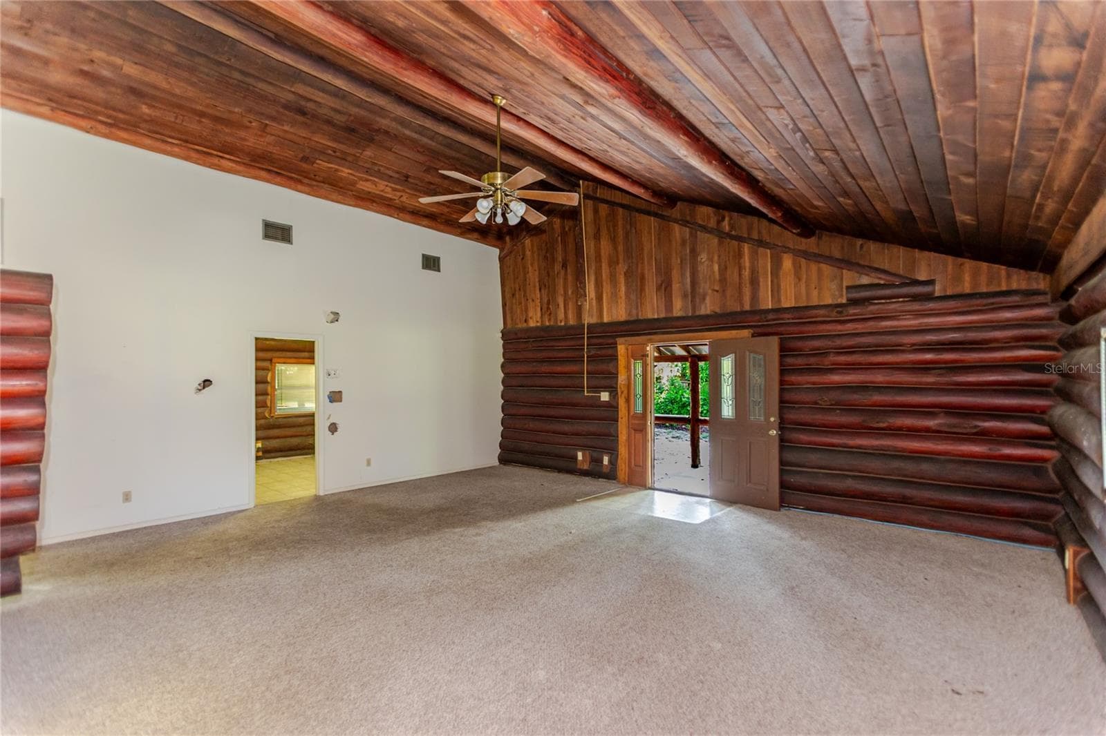Living Room with Wood Beamed Ceiling & Walls - 13203 BLISSFIELD, ODESSA