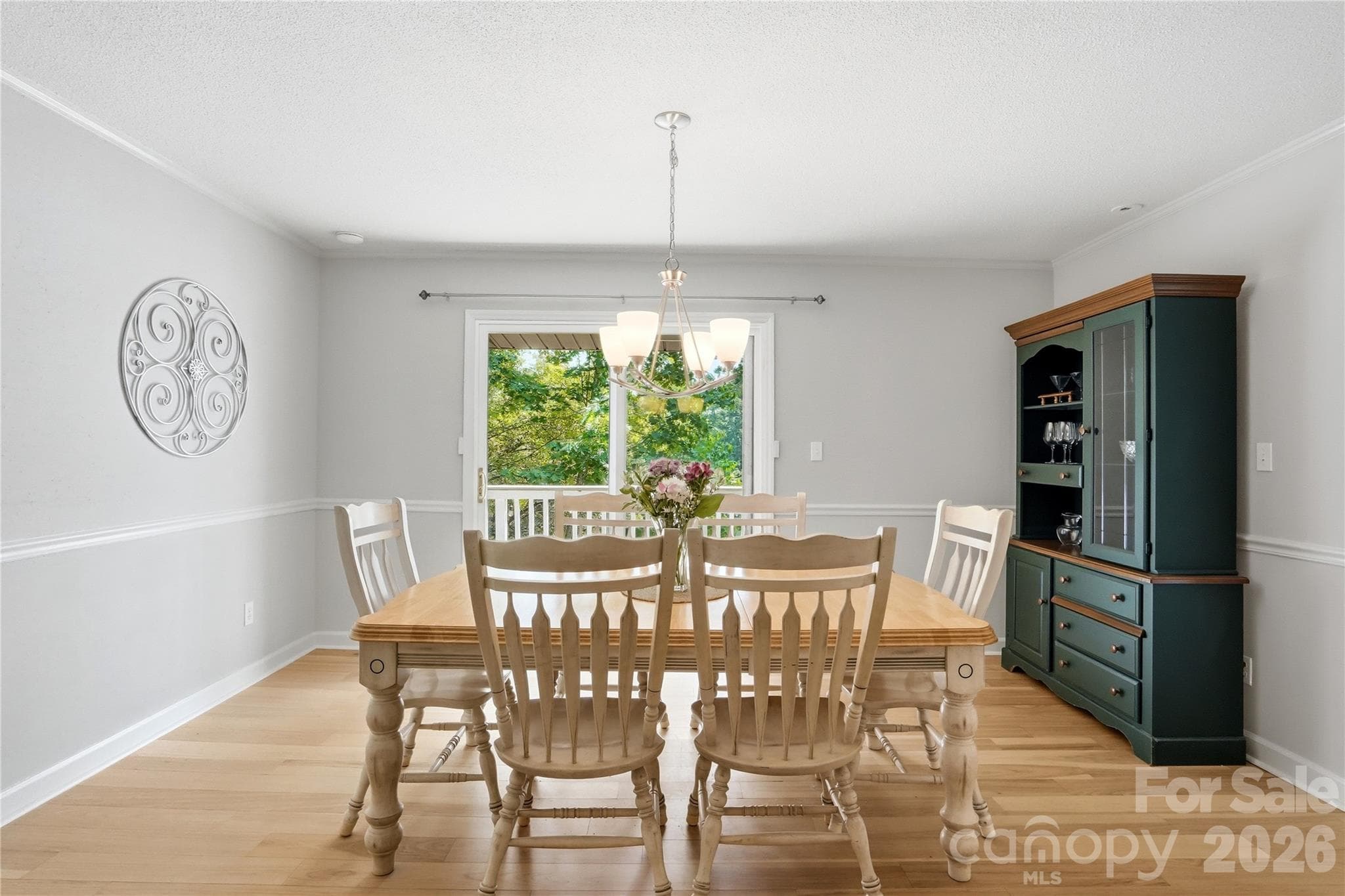 Dining room framed by picturesque water views - 1113 Palmyra Drive, Tega Cay