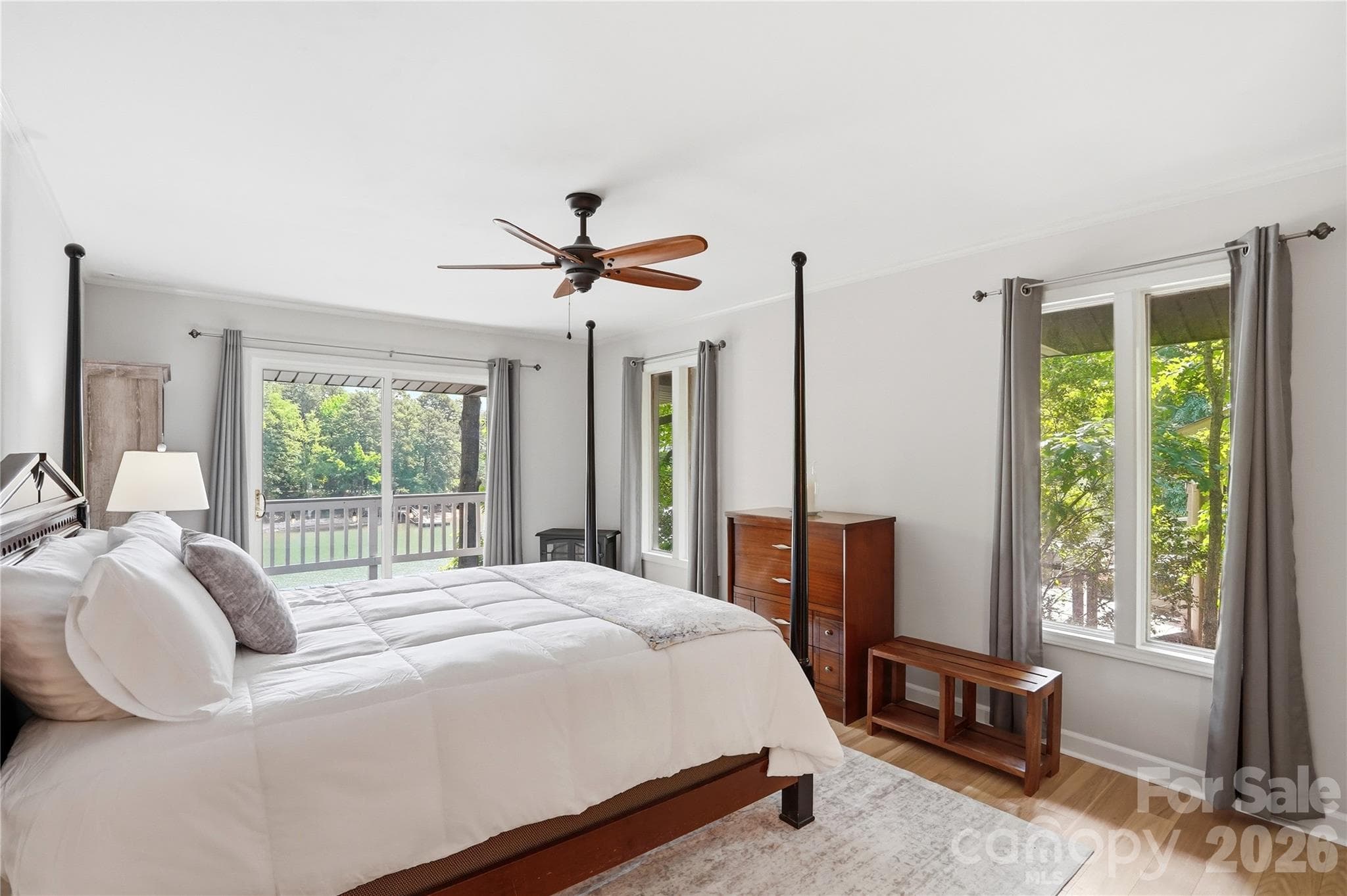 Primary bedroom with glorious lake views - 1113 Palmyra Drive, Tega Cay