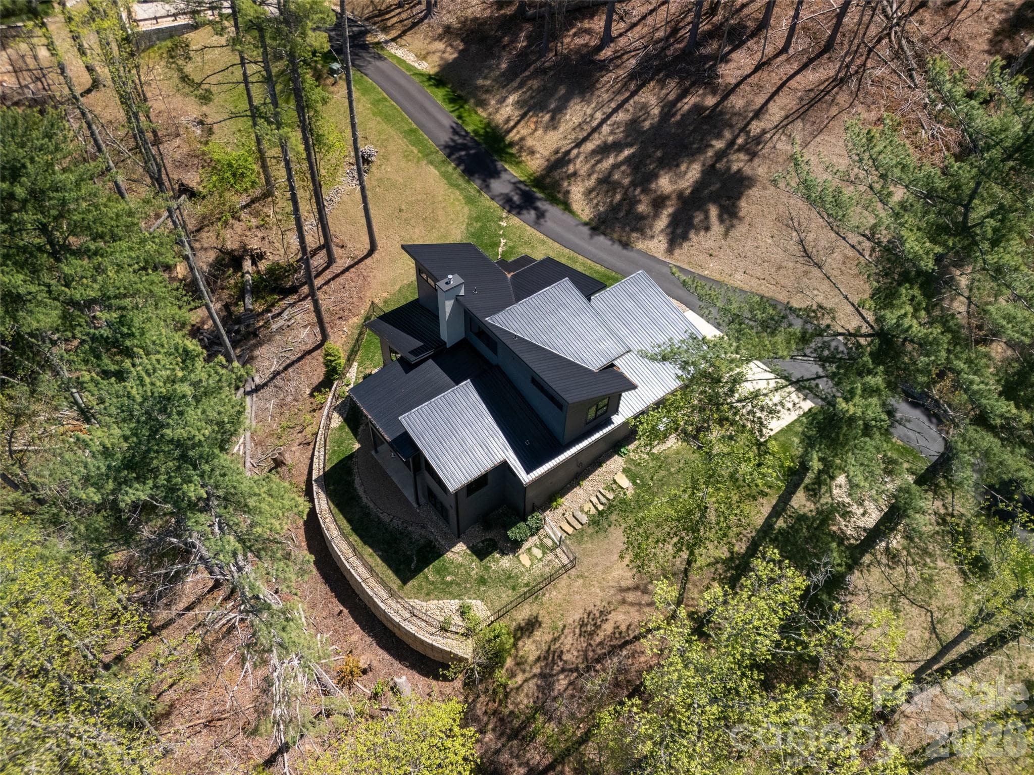 Expansive 1.53 acre lot nestled perfectly into the landscape. - Asheville