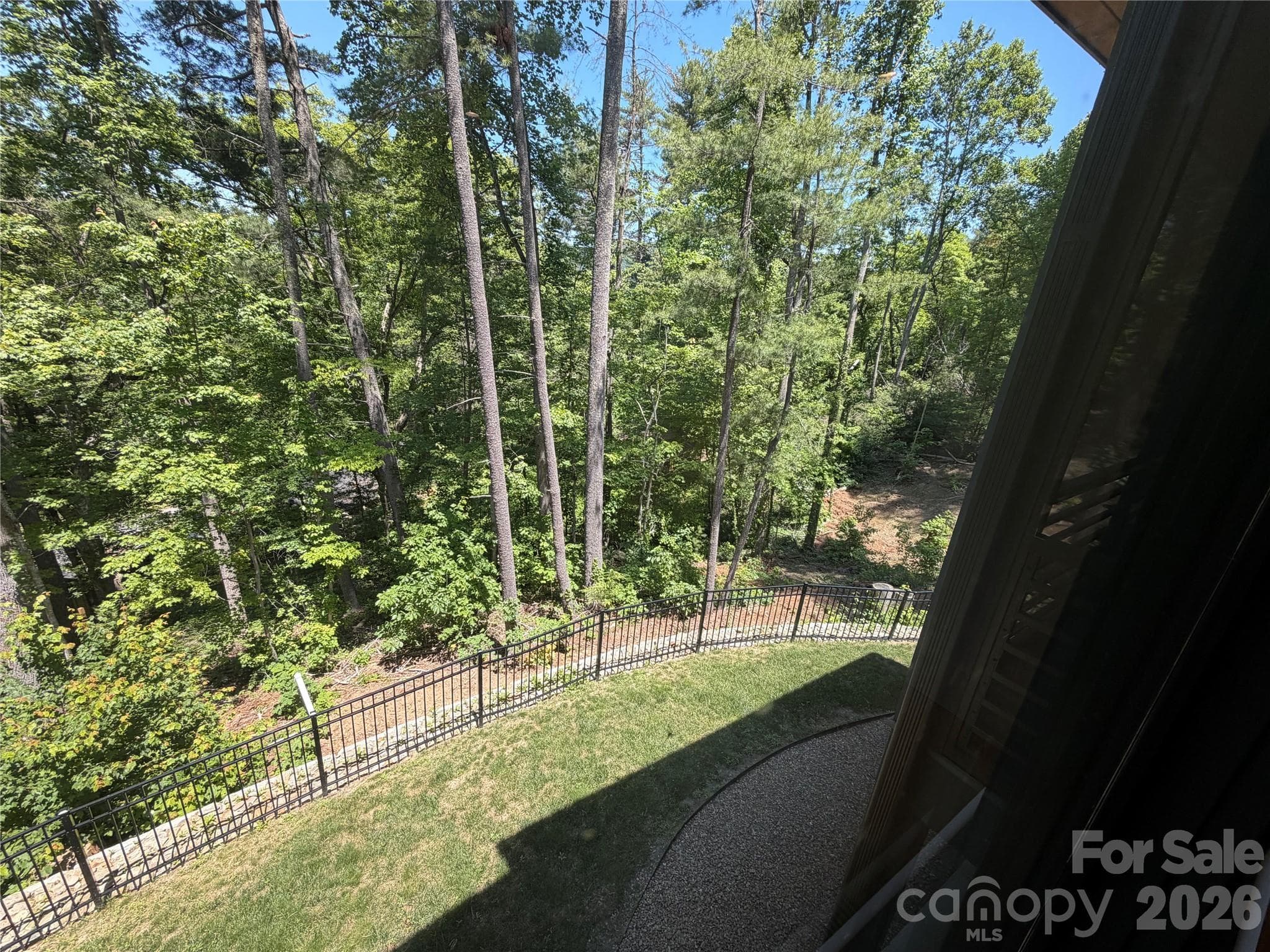 You'll feel like you're living in a treehouse as the trees and nature can be viewed from every window!! - Asheville