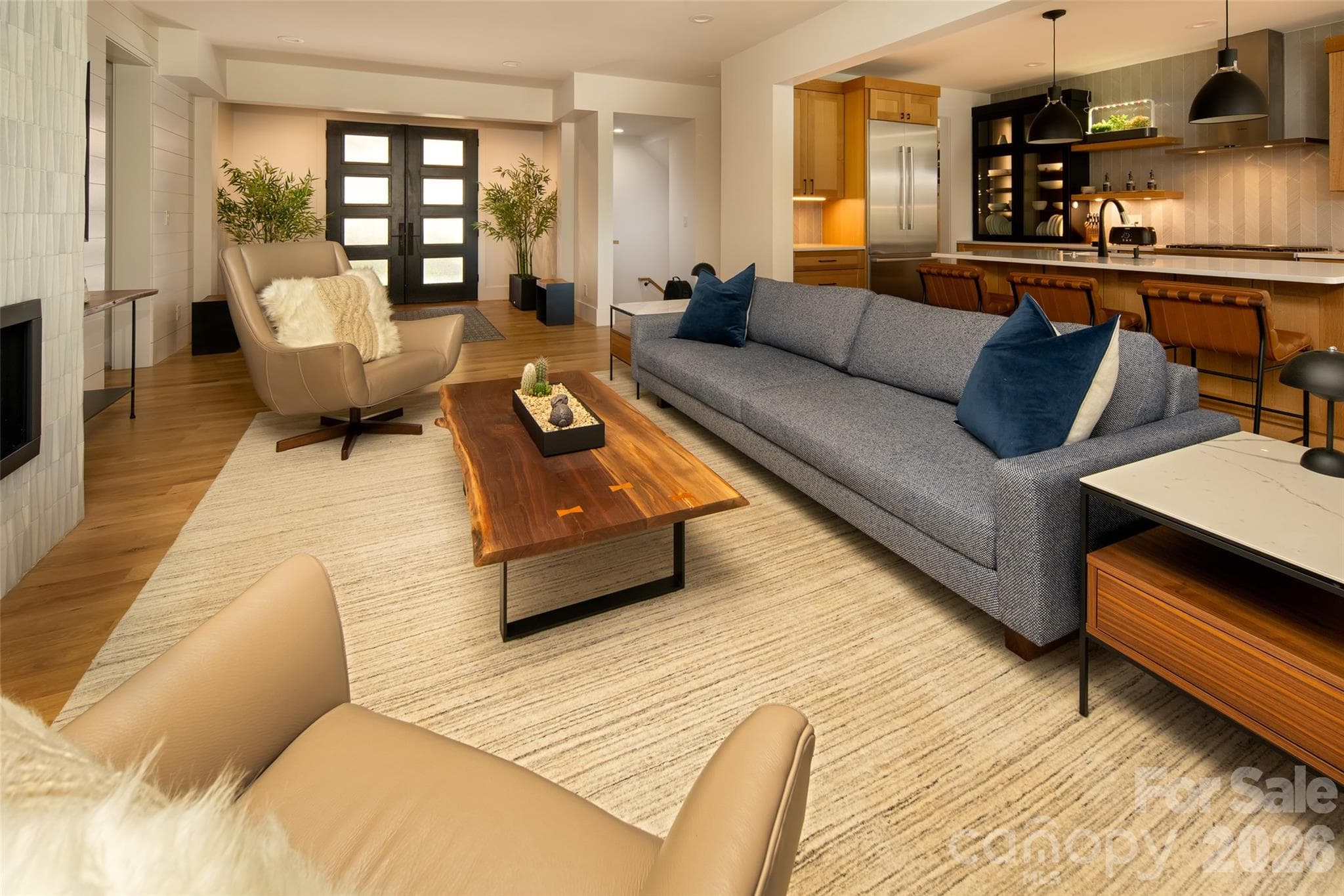 Open living/entertaining spaces flow seamlessly between living room, kitchen, dining and covered/screened porch. - Asheville