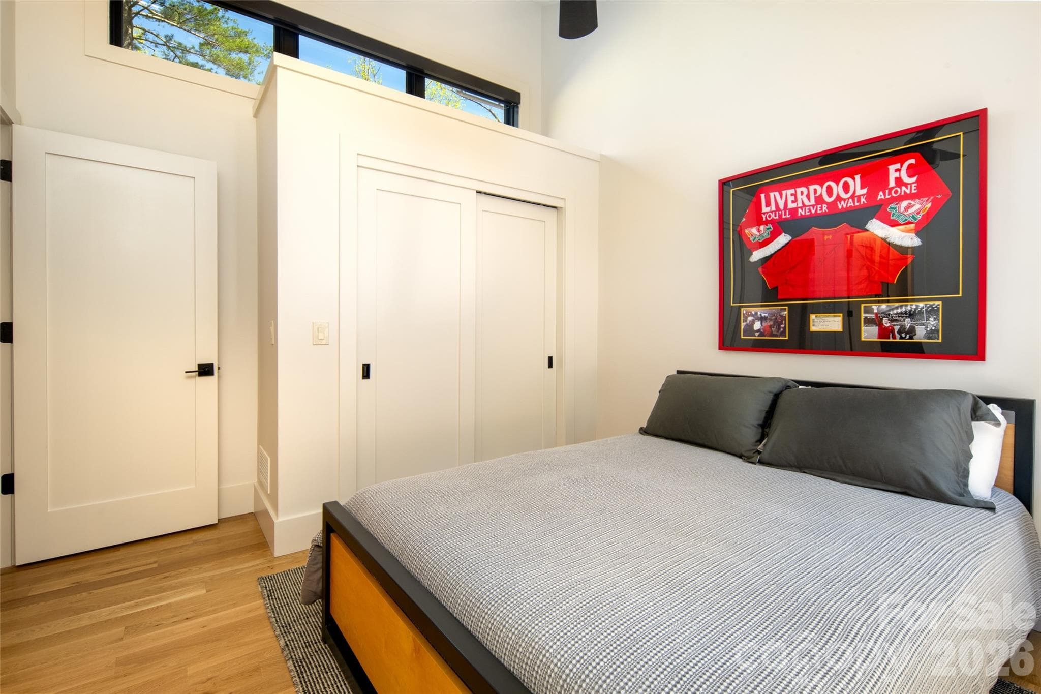 First of three spacious second floor bedrooms with vaulted ceilings, windows bringing in tons of natural light, and ample closet storage. - Asheville