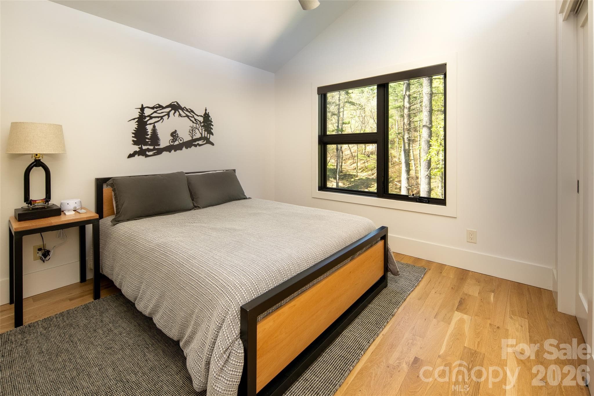 Second of three bedrooms on second floor features vaulted ceiling and incredible views. - Asheville