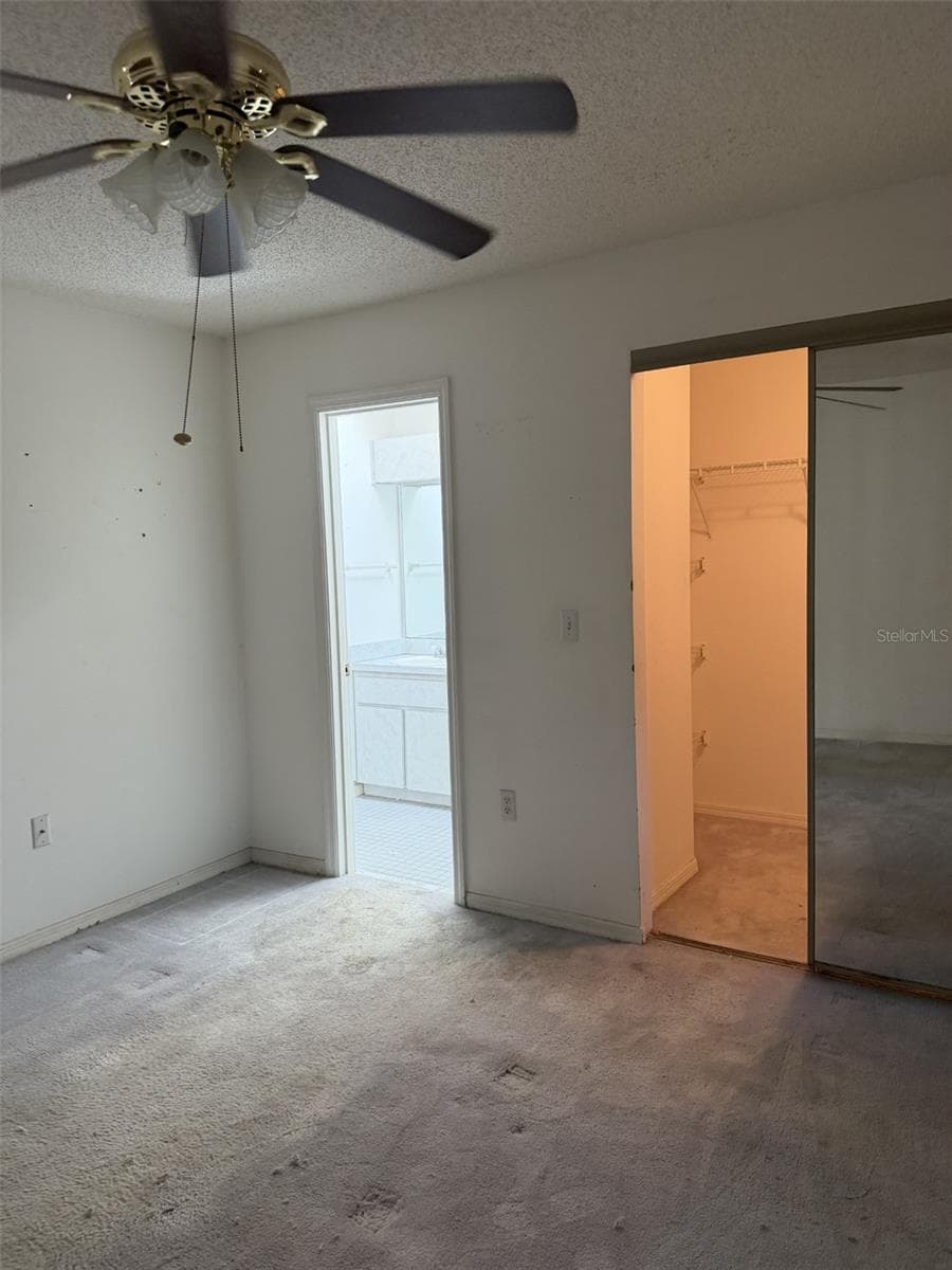 MASTER BEDROOM AND WALKING CLOSET - 412 WESTWOOD DR, LEESBURG
