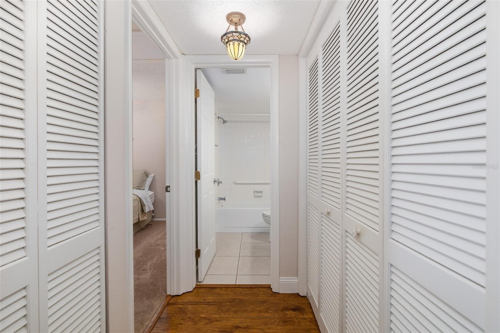 Laundry located in hallway on the right - 130 NANCY DR #37, OLDSMAR