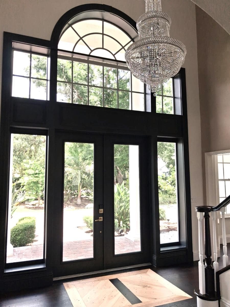 Stunning EntryWay. New Front Doors flanked by Grapefruit & Navel Orange Trees just outside - 3171 DICK WILSON DR, SARASOTA