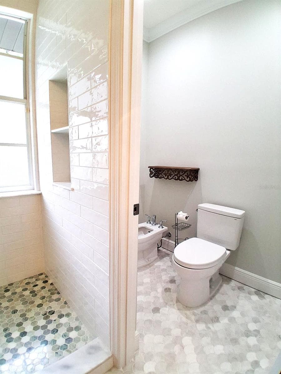New Toilets and New Bidet in 2nd toilet room. Marble Floors. Crown Molding even in the Bathrooms. Extra luxury everywhere - 3171 DICK WILSON DR, SARASOTA