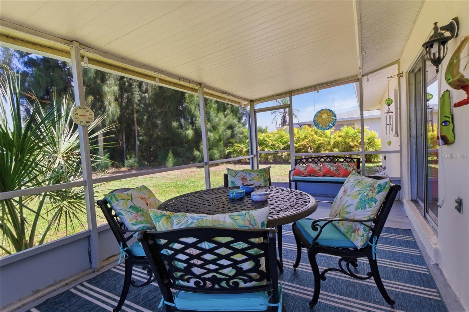 Enjoy your morning coffee in the screened in patio - 52 ANNAPOLIS LN, ROTONDA WEST