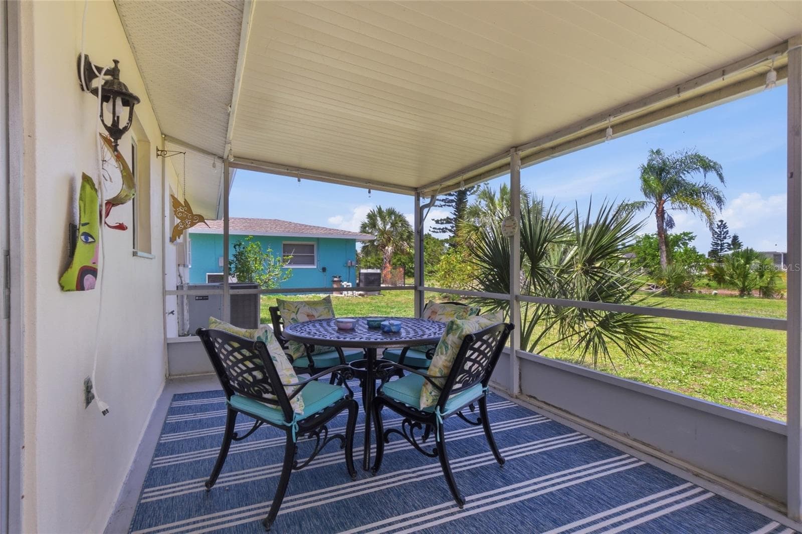 Screened In Patio overlooking the water - 52 ANNAPOLIS LN, ROTONDA WEST