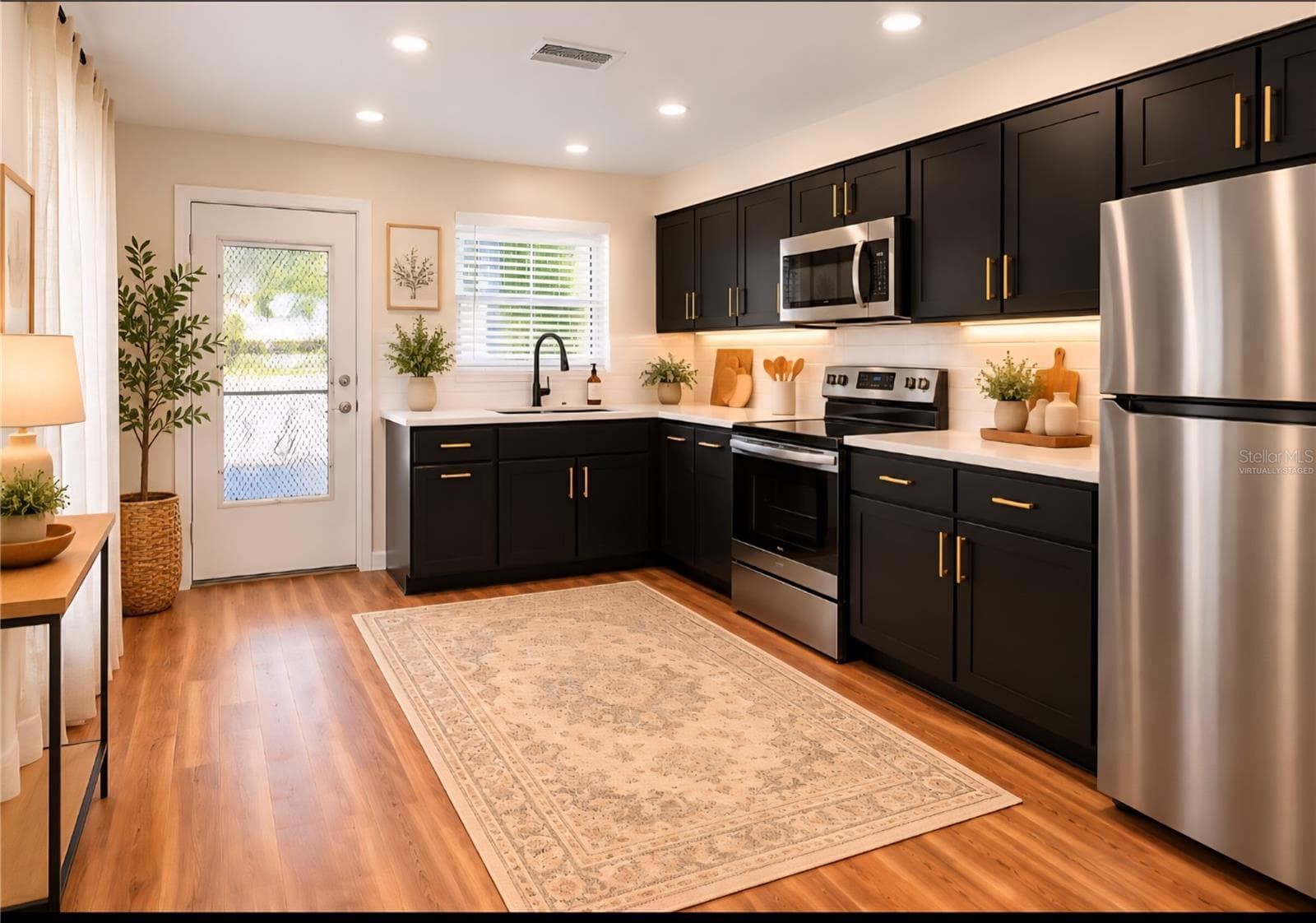 Virtually staged kitchen - 1213 8TH ST NW, WINTER HAVEN