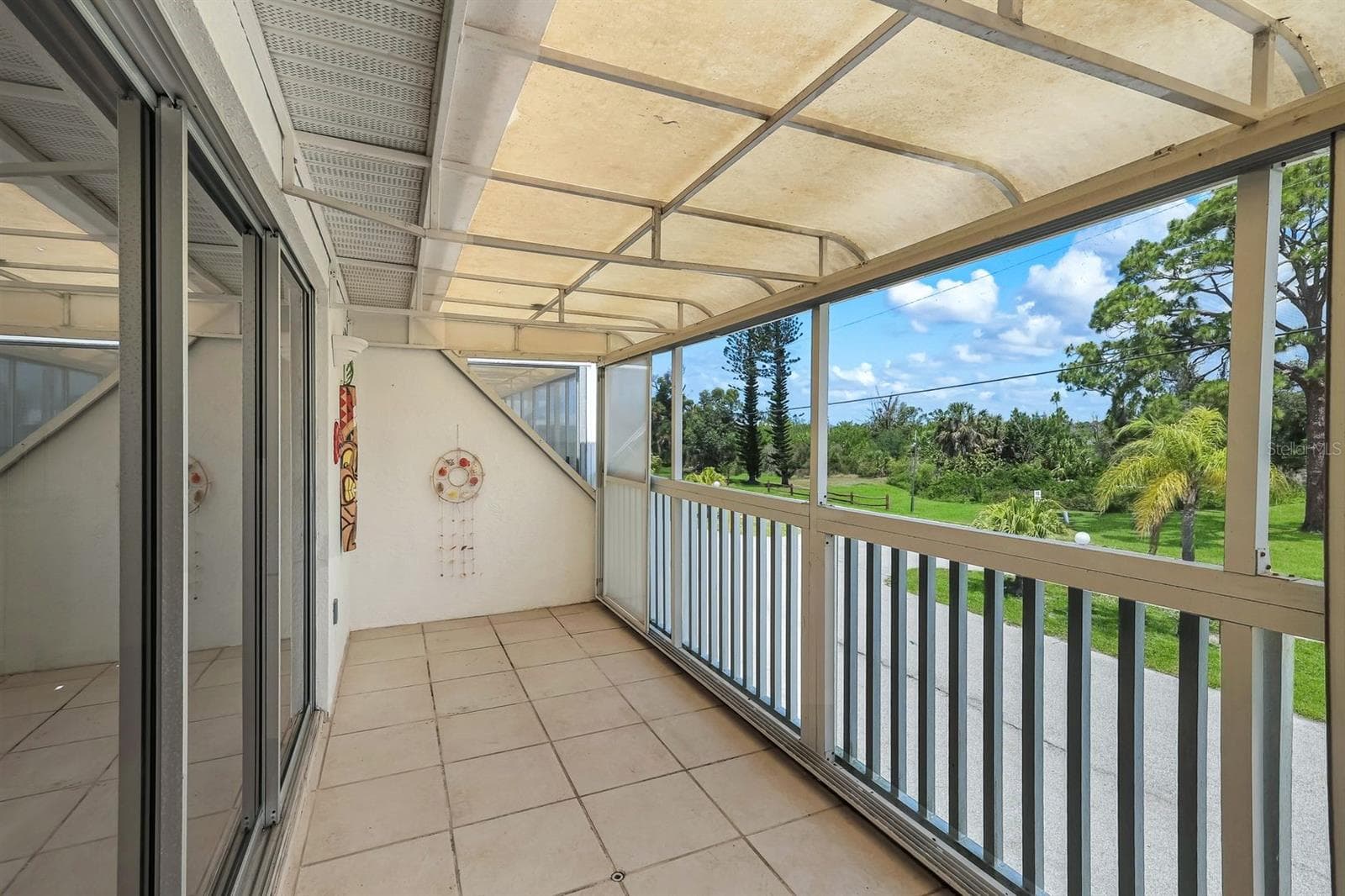 Balcony/Lanai from Living Room - 6800 PLACIDA RD #TH13, ENGLEWOOD