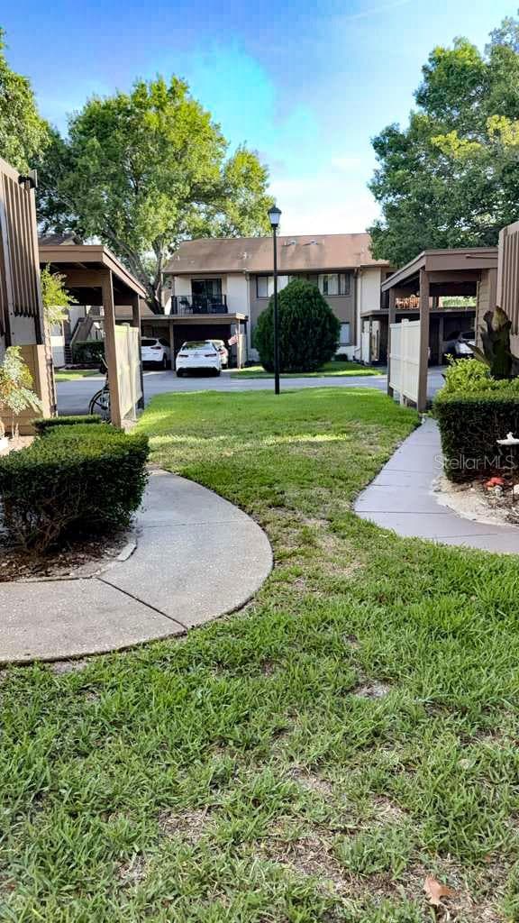 Looking out towards the street as you leave your home. - 12922 WEDGEWOOD WAY #A, HUDSON