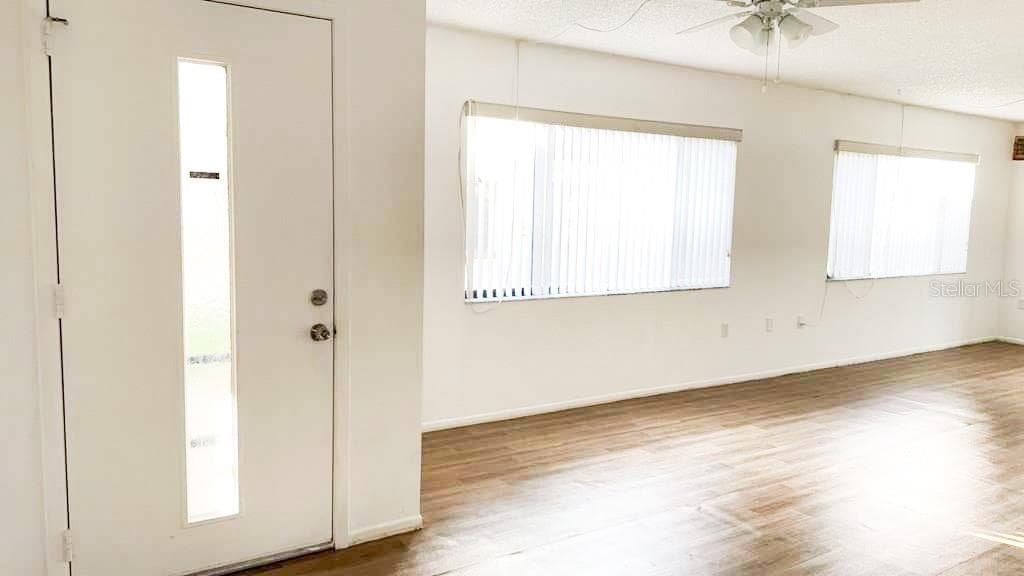 Front door and dining room living room windows - 12922 WEDGEWOOD WAY #A, HUDSON