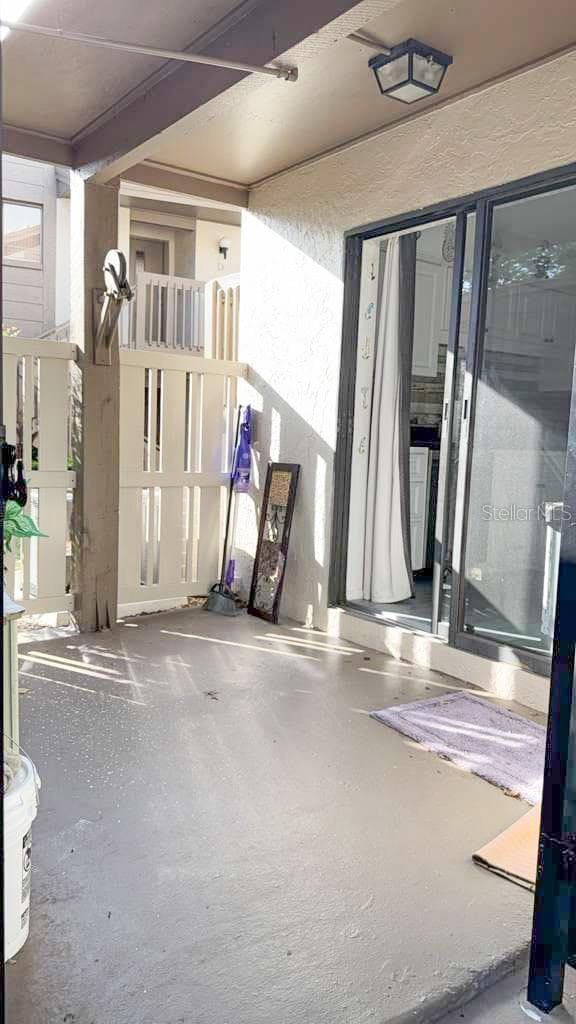 Private front entrance to patio straight into kitchen from the car port - 12922 WEDGEWOOD WAY #A, HUDSON