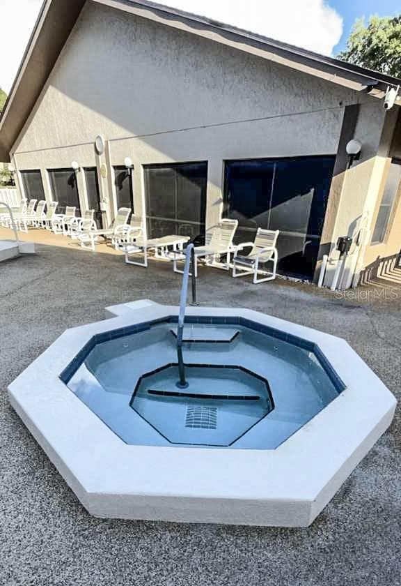 Jacuzzi and back of clubhouse - 12922 WEDGEWOOD WAY #A, HUDSON