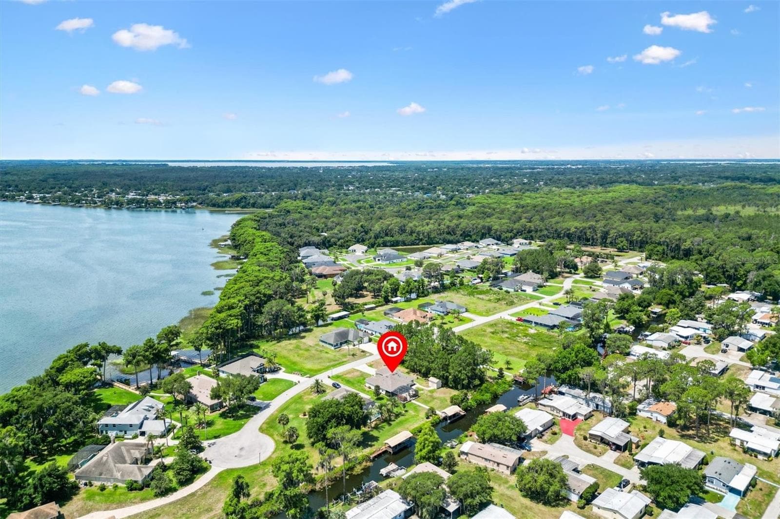 Just a hop, skip, and a jump away from your next chapter and new adventure, enjoying everything the beautiful Harris Chain of Lakes lifestyle has to offer. - 12107 EAGLE POINT CT, LEESBURG