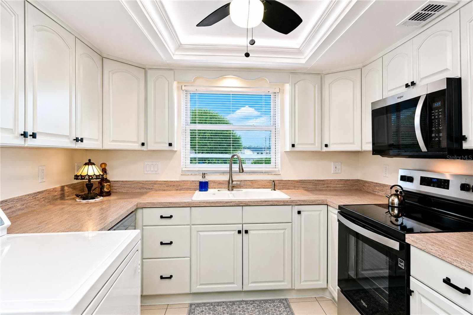 Plenty of storage and counter prep space for you - 4853 INDEPENDENCE DR, BRADENTON