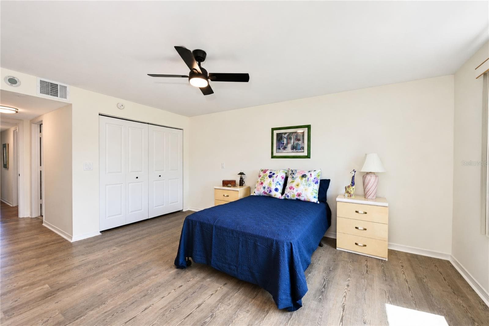 Primary bedroom has dual closets, one seen here and one across from the ensuite bathroom - 4853 INDEPENDENCE DR, BRADENTON