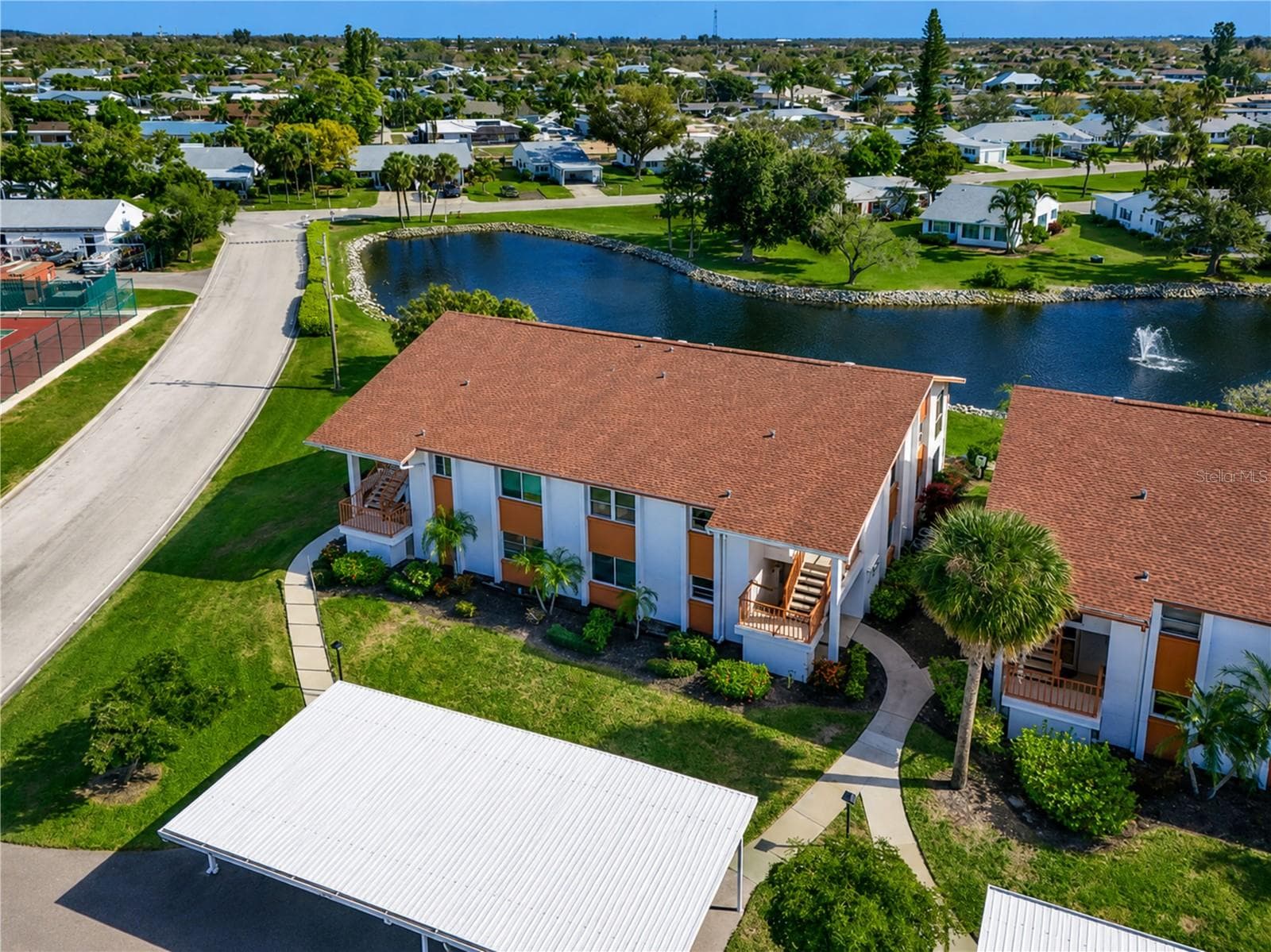 The condo's location is convenient to all the amenities and has lots of guest parking - 4853 INDEPENDENCE DR, BRADENTON