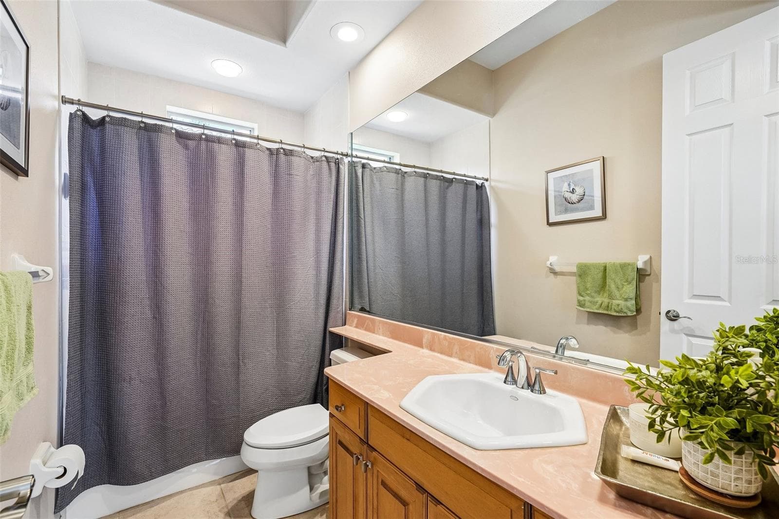 Fourth bathroom with tub located upstairs - 9039 WATERASH LN N, PINELLAS PARK