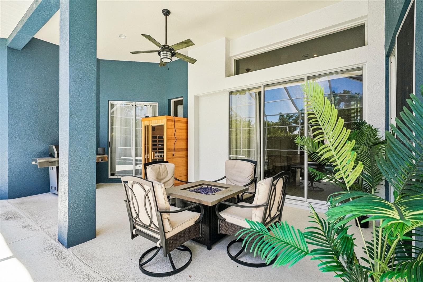 Pool dining or fire pit area - 9039 WATERASH LN N, PINELLAS PARK