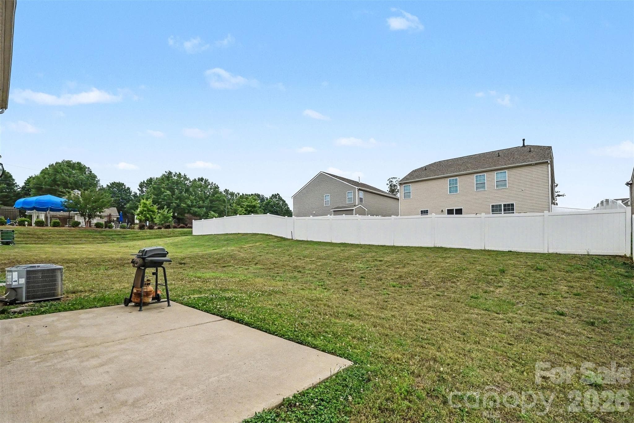 Backyard and patio - 8515 Mansell Court, Charlotte