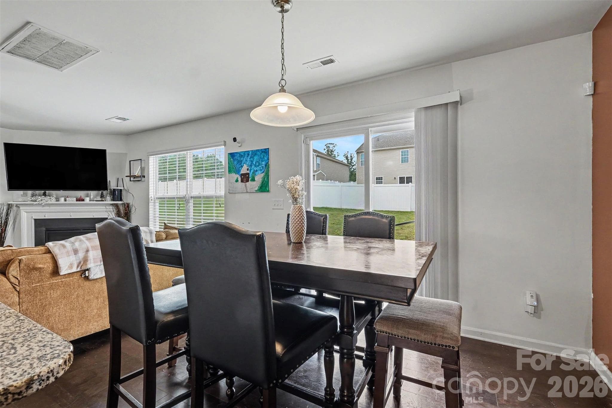 Breakfast nook into living room - 8515 Mansell Court, Charlotte