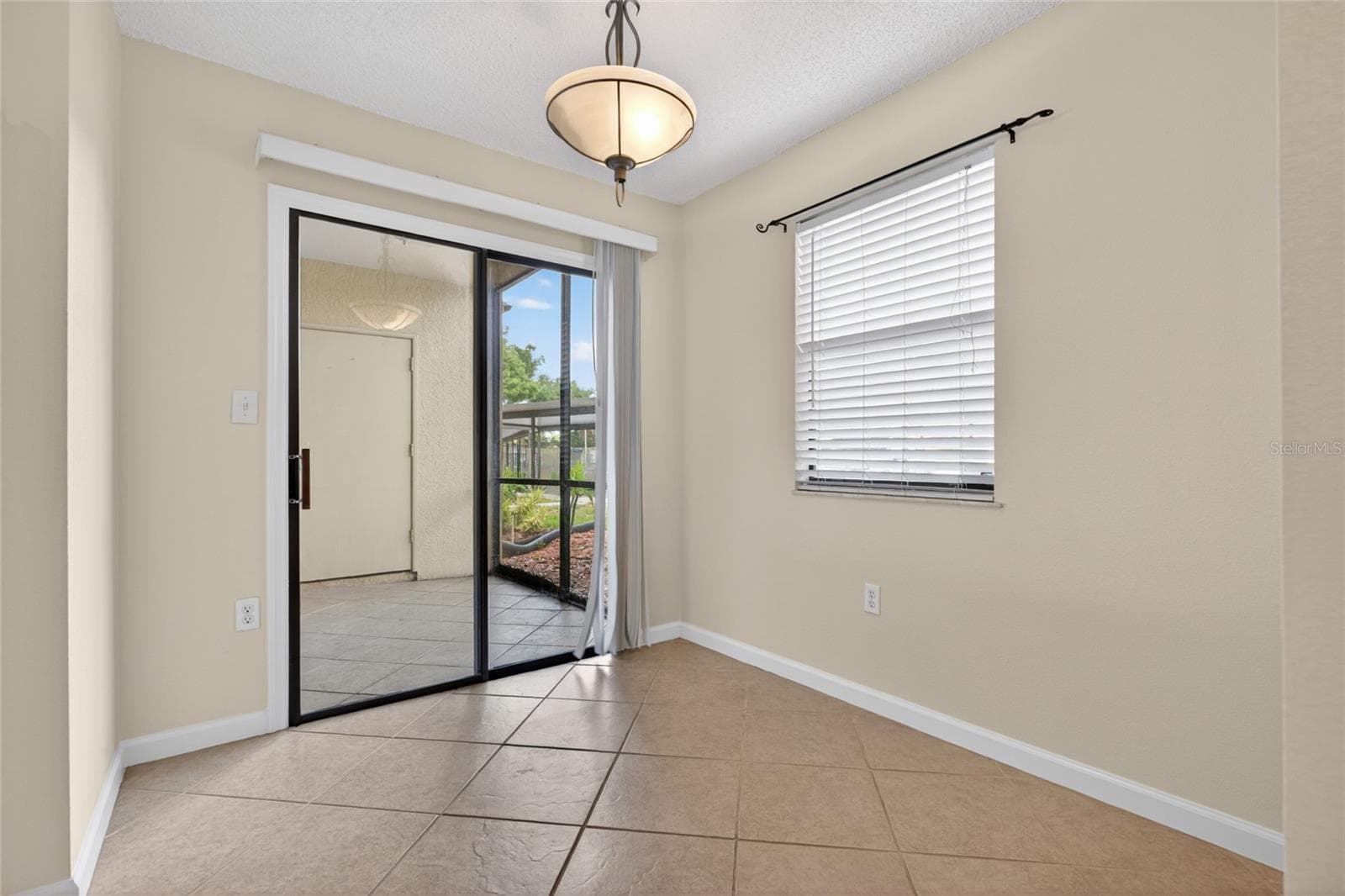 The dining room, off of the kitchen. - 10125 SAILWINDS BLVD N #104, LARGO