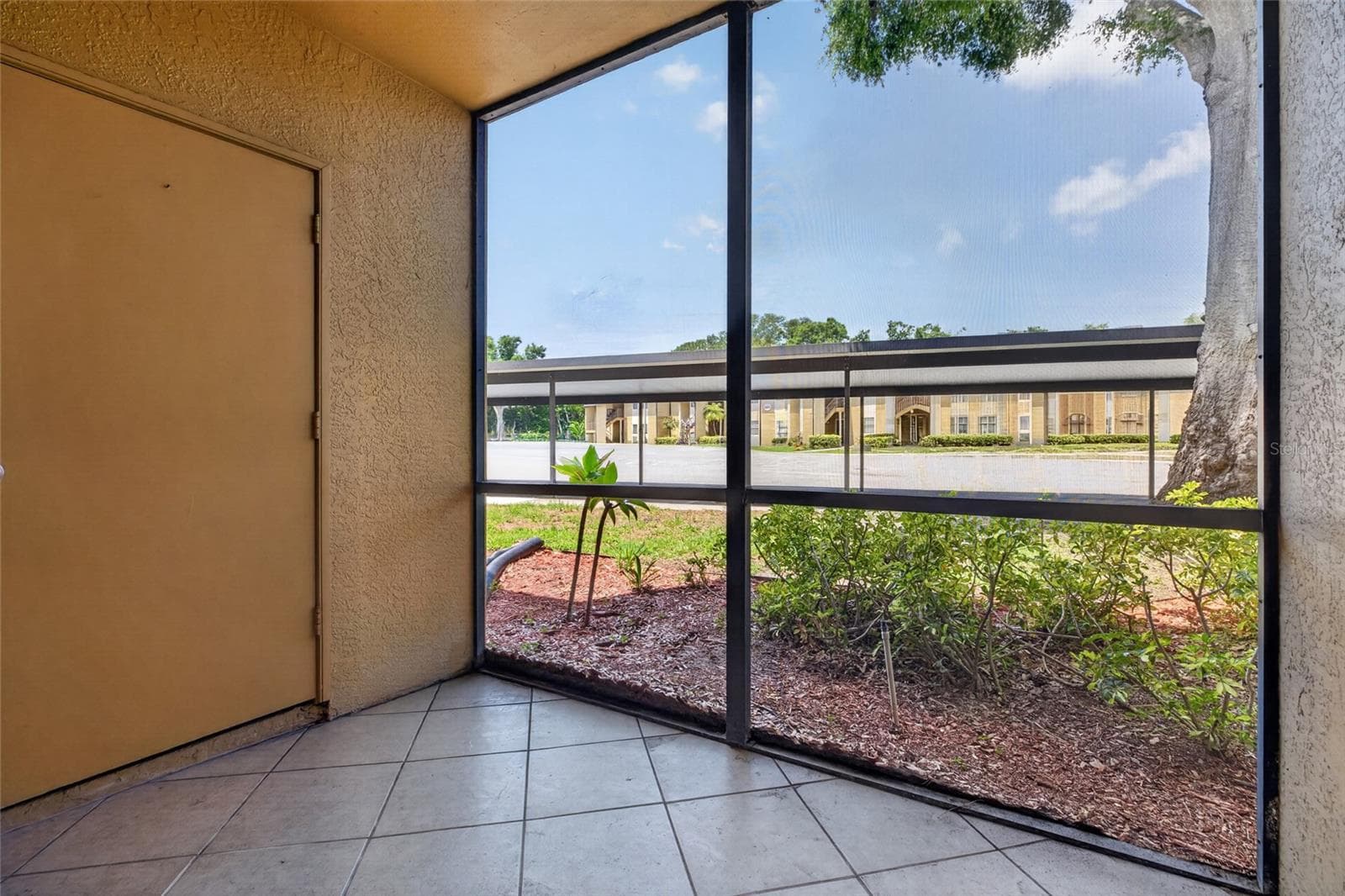 Screened, front lanai. - 10125 SAILWINDS BLVD N #104, LARGO