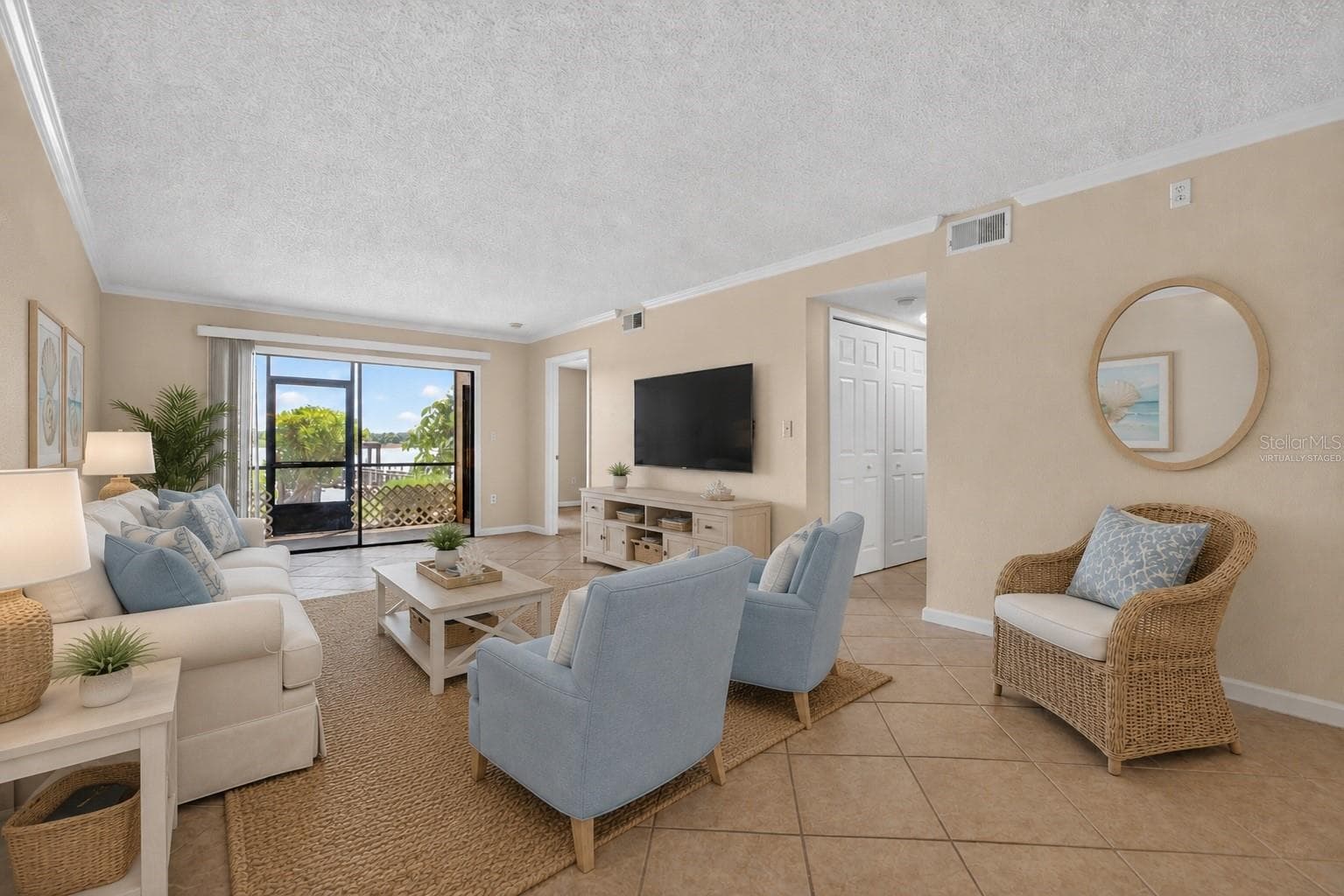 Virtually staged living room. - 10125 SAILWINDS BLVD N #104, LARGO
