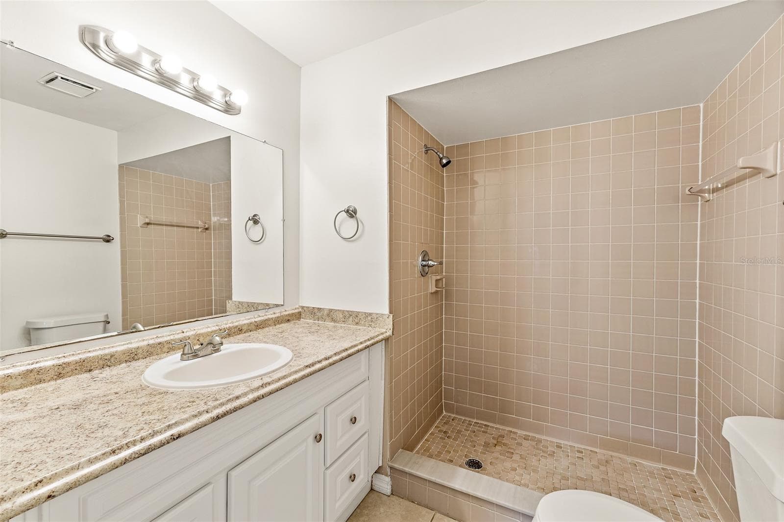 Primary Bath with Tiled Walk-In Shower - 48 HEPBURN PL, MERRITT ISLAND
