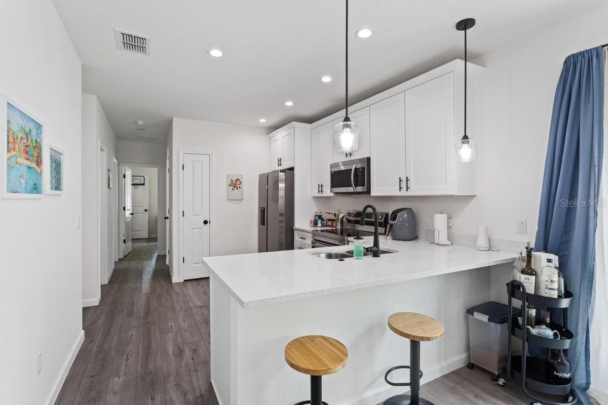 Kitchen with Breakfast Bar - 1967 VIRGINIA AVE, EUSTIS