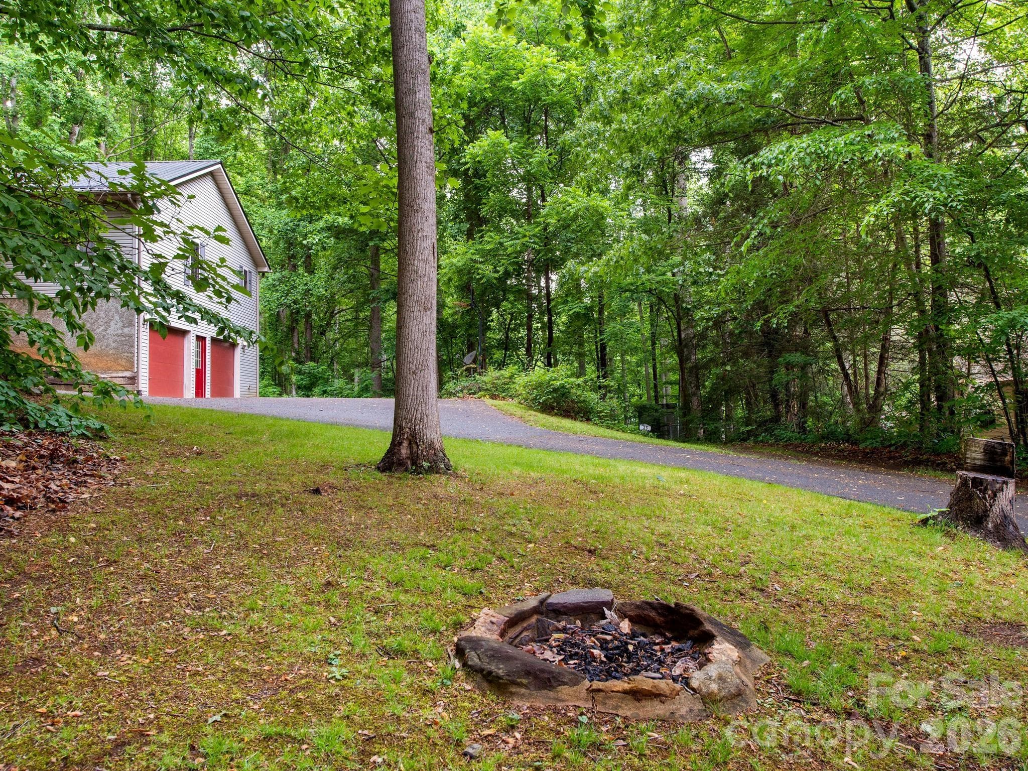 Fire pit for evening fires with friends and family - 37 Leatherwood Drive, Candler