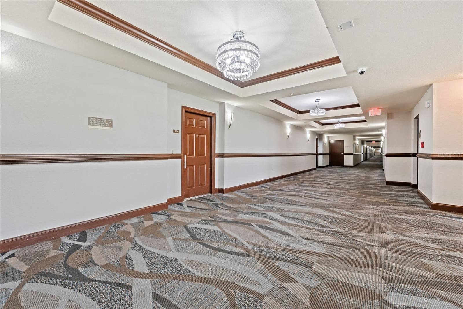 Hallway and #409 on left - 14200 AVALON RD #409, WINTER GARDEN