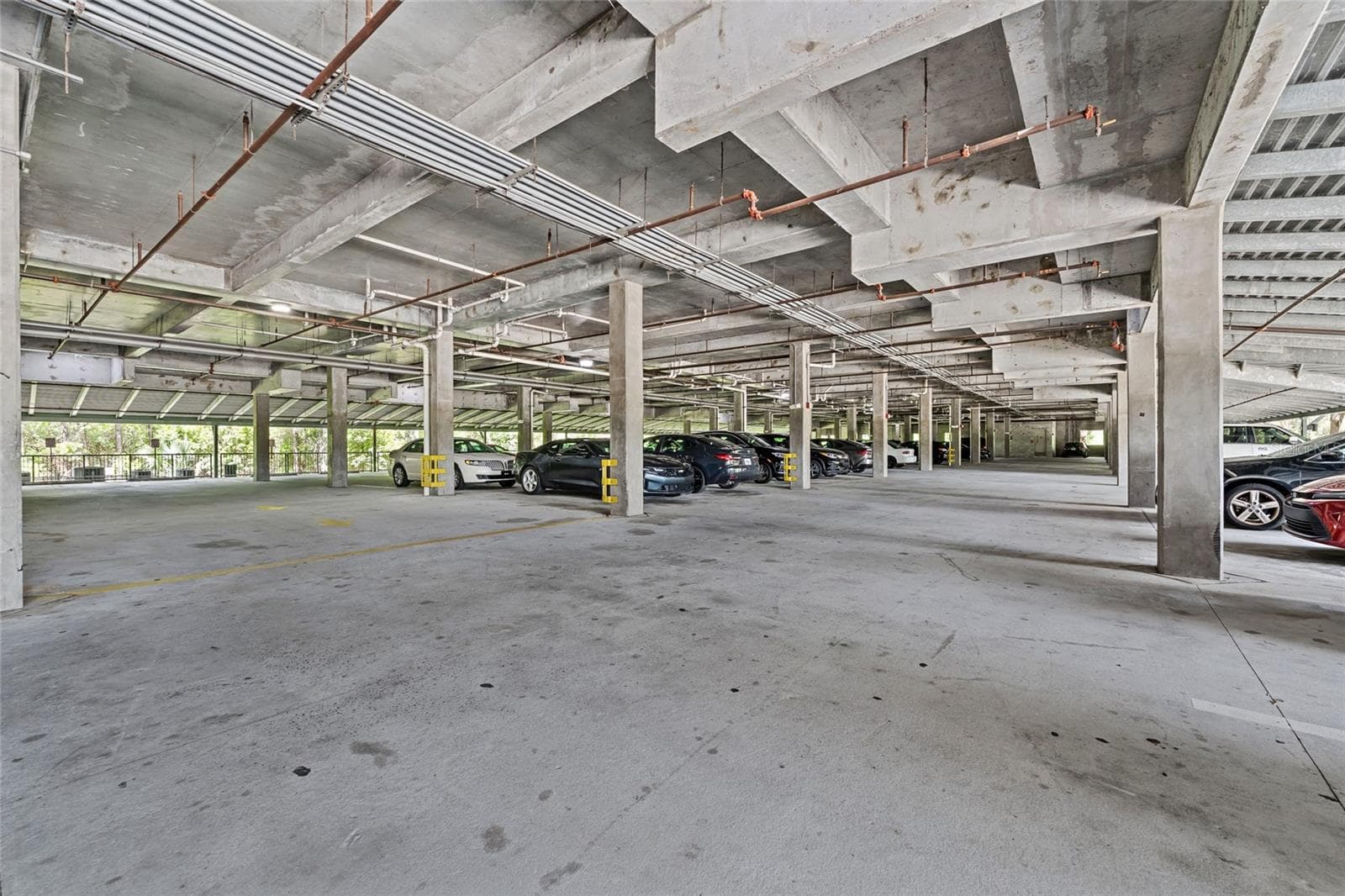 Covered parking - open spaces - not designated to any specific unit - 14200 AVALON RD #409, WINTER GARDEN