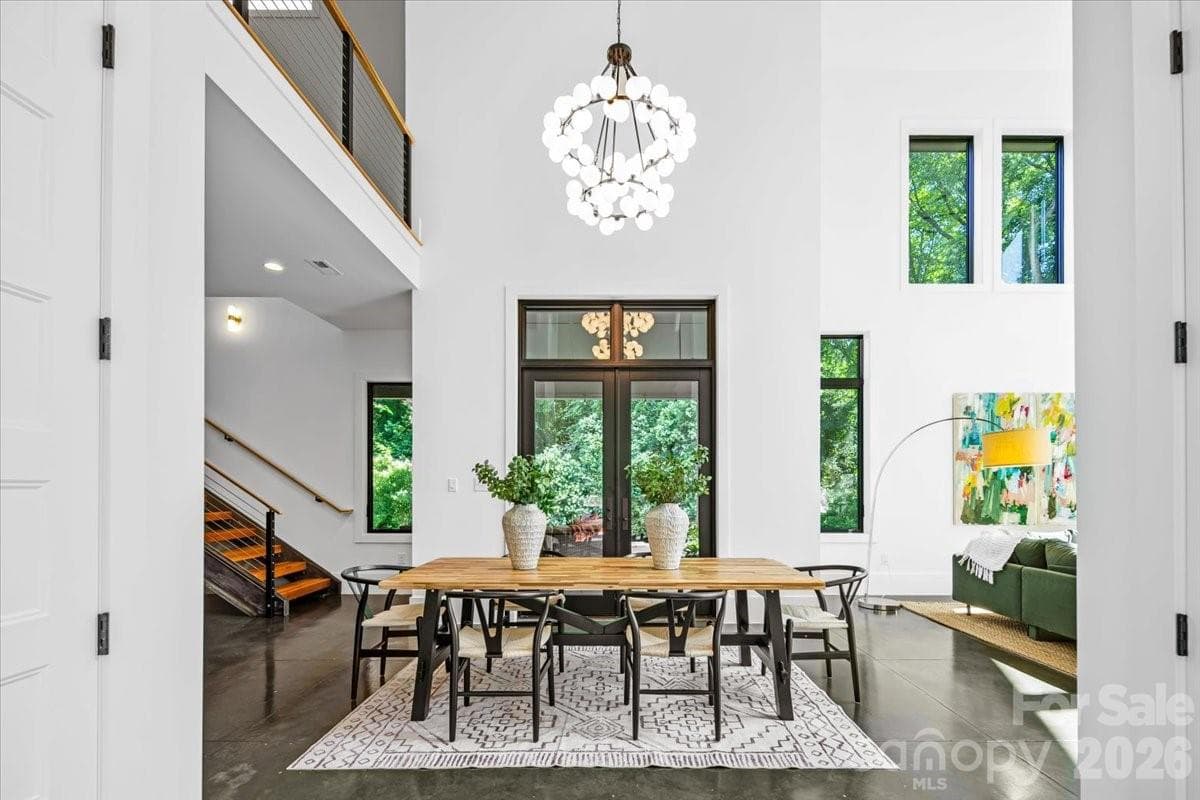 Show stopper open dining area with designer chandelier - Charlotte