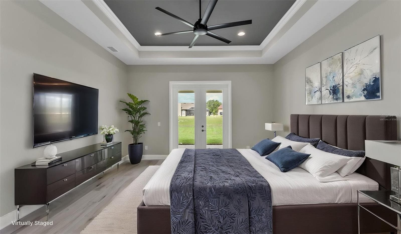 virtually staged/primary bedroom - 6827 LAKELAND HIGHLANDS RD, LAKELAND