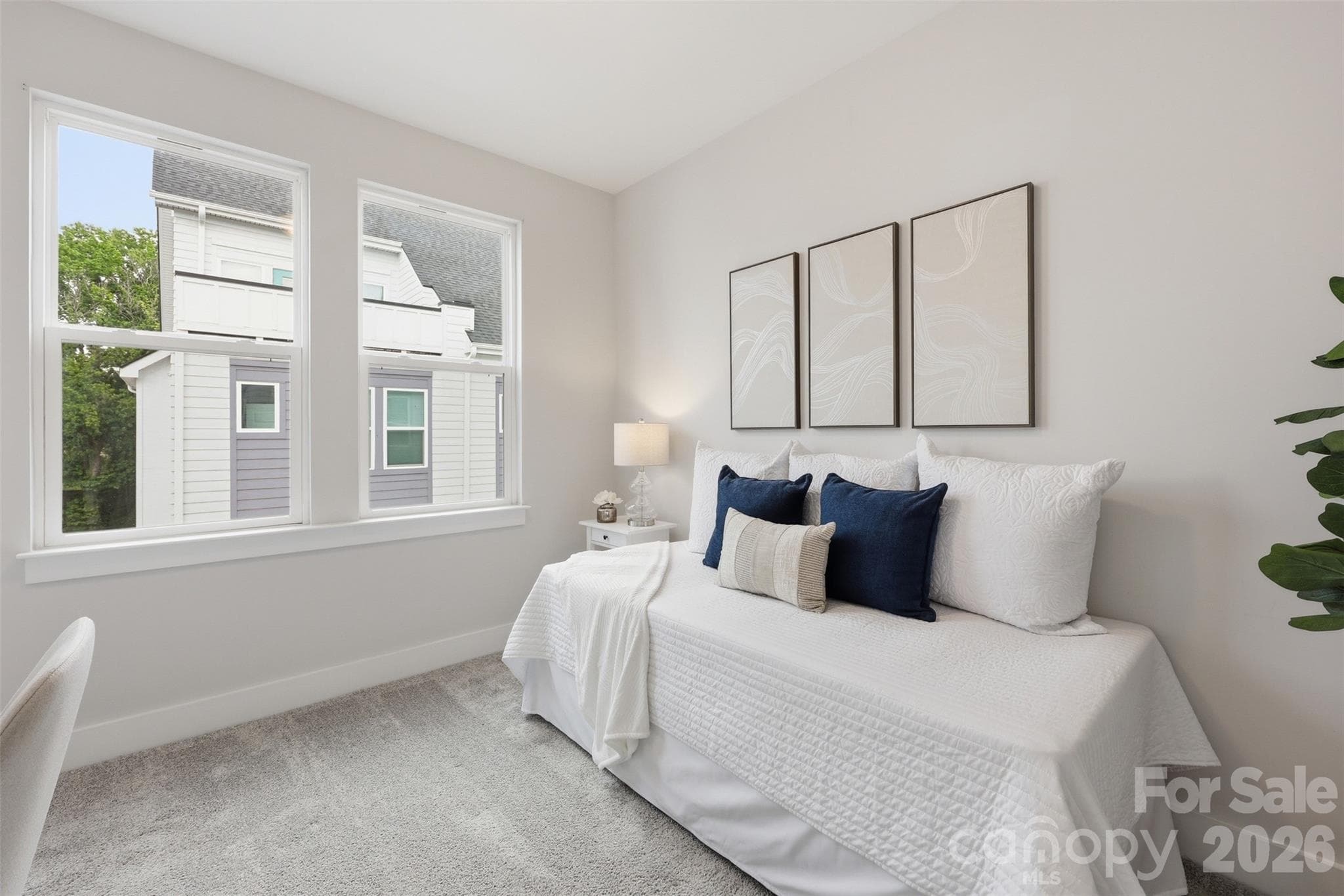 Multipurpose guest bedroom and office with walk-in closet. - 2148 Electric Lane, Charlotte