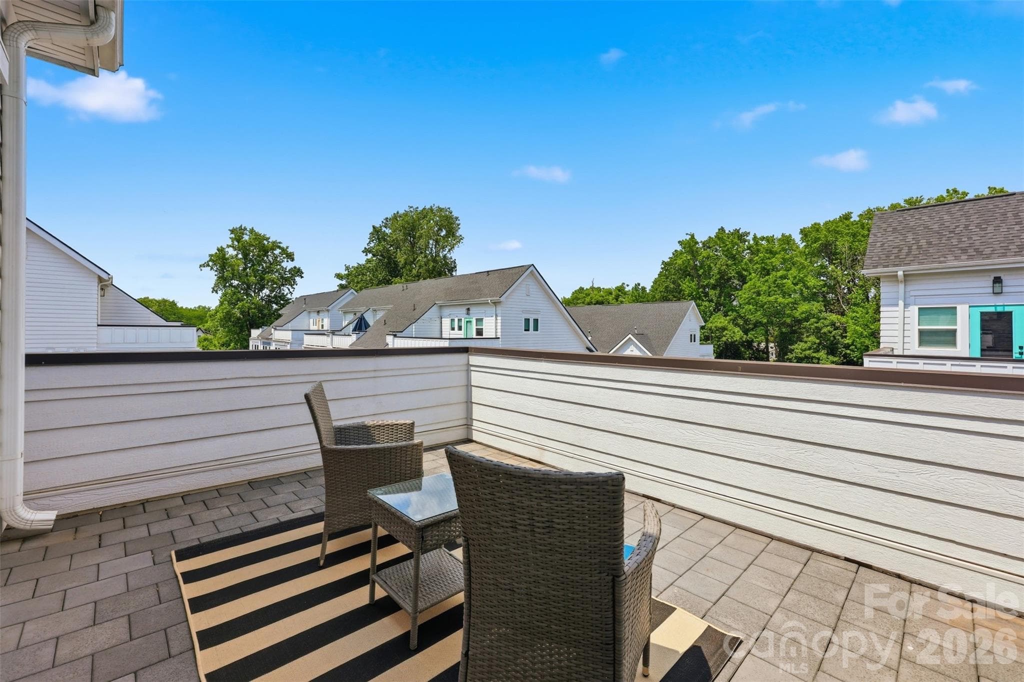 Take in the sunshine and enjoy the great outdoors on your large terrace. - 2148 Electric Lane, Charlotte