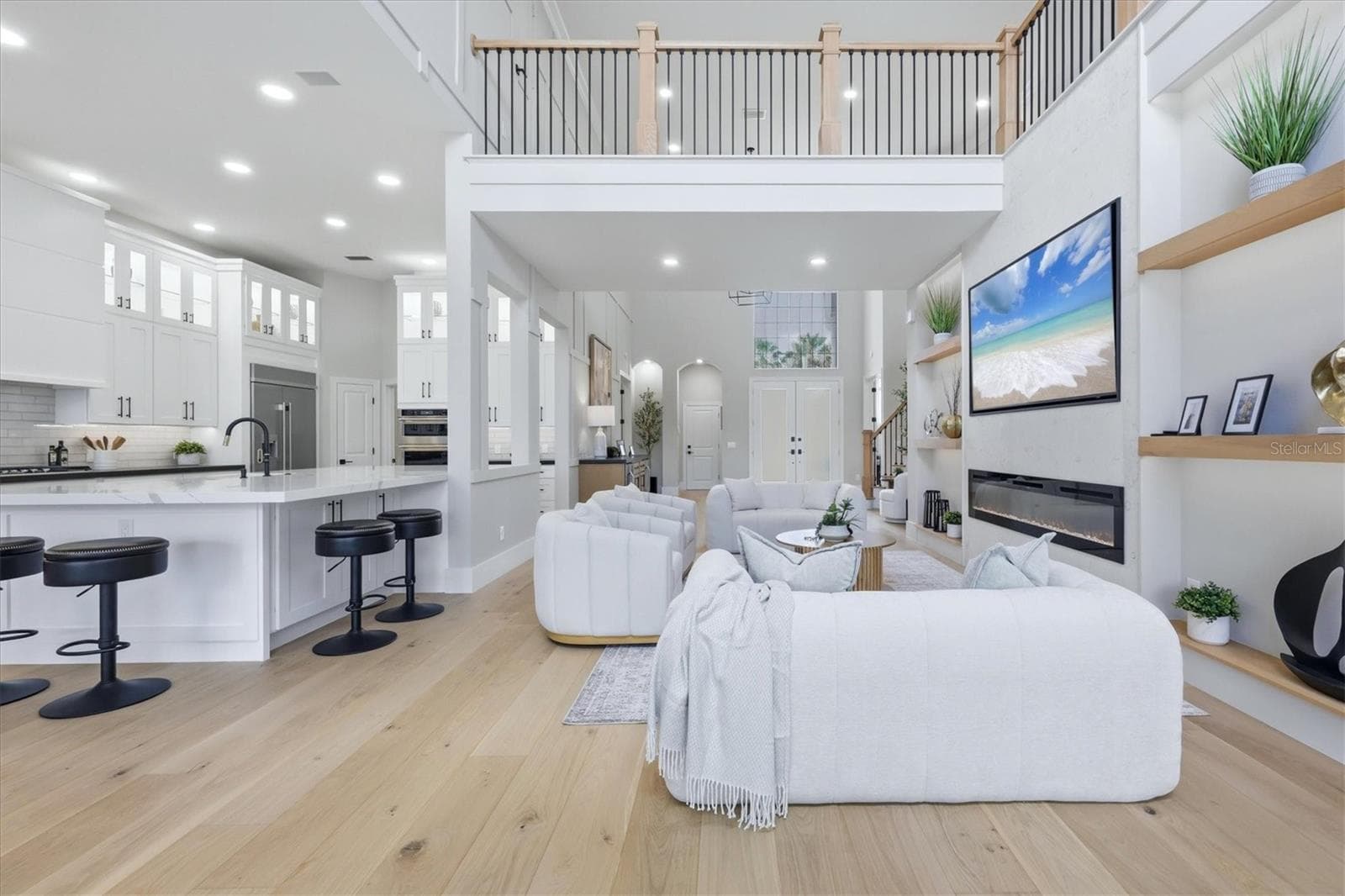 Family Room, Kitchen and View of 2nd Floor Sitting Area - 3606 FAIR OAKS PL, LONGBOAT KEY