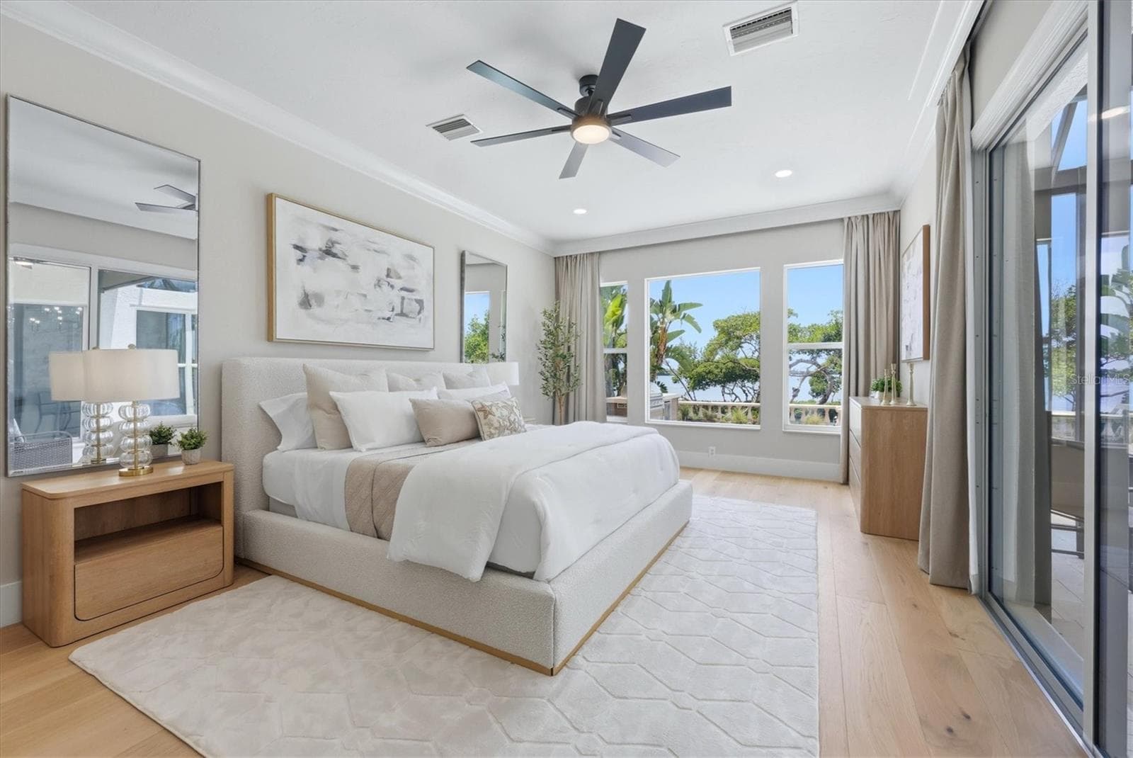 Primary Suit Bedroom has Sliding Glass Doors and Bay Views - 3606 FAIR OAKS PL, LONGBOAT KEY