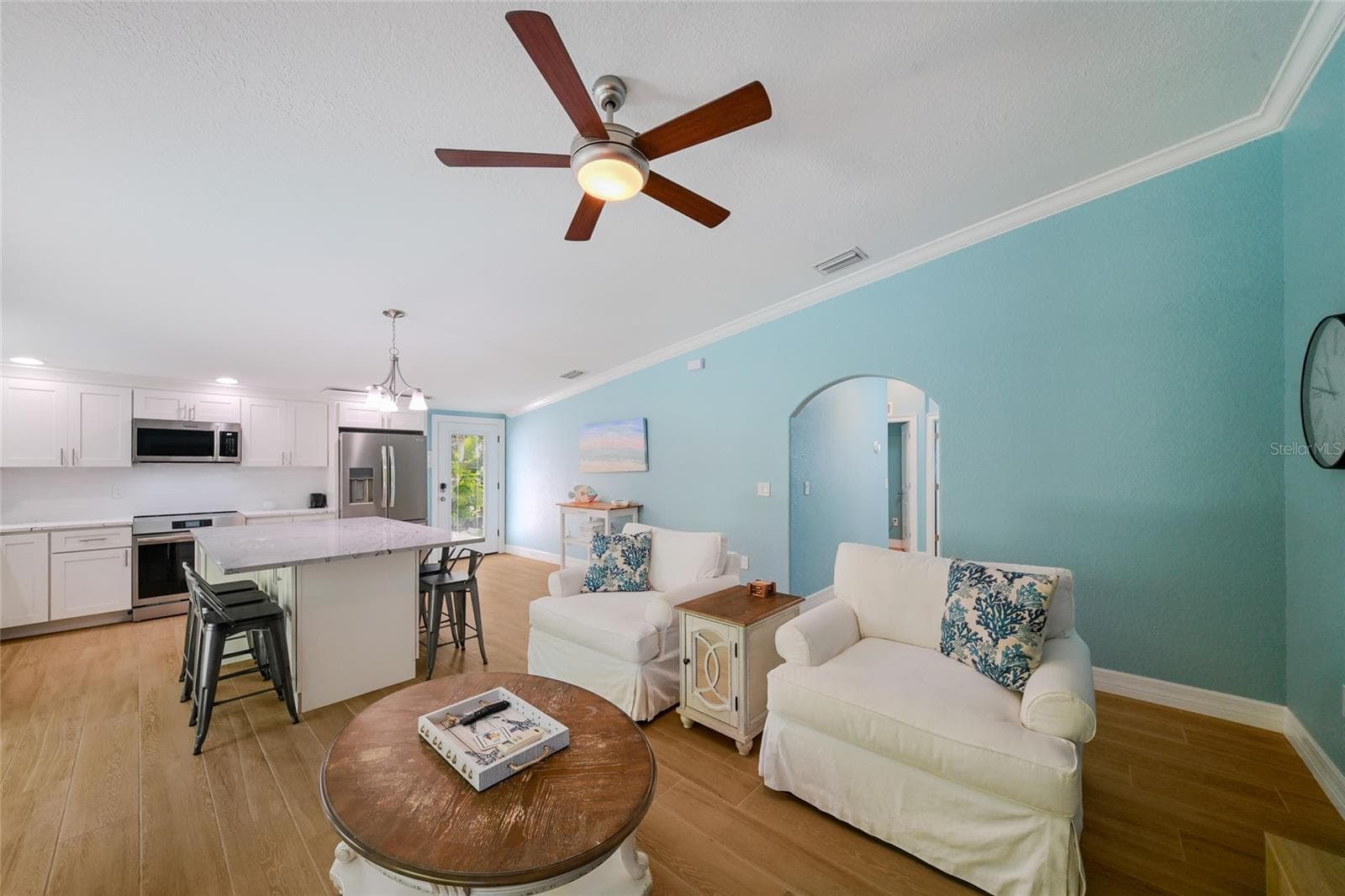 Living room is open to the kitchen - 324 64TH ST, HOLMES BEACH