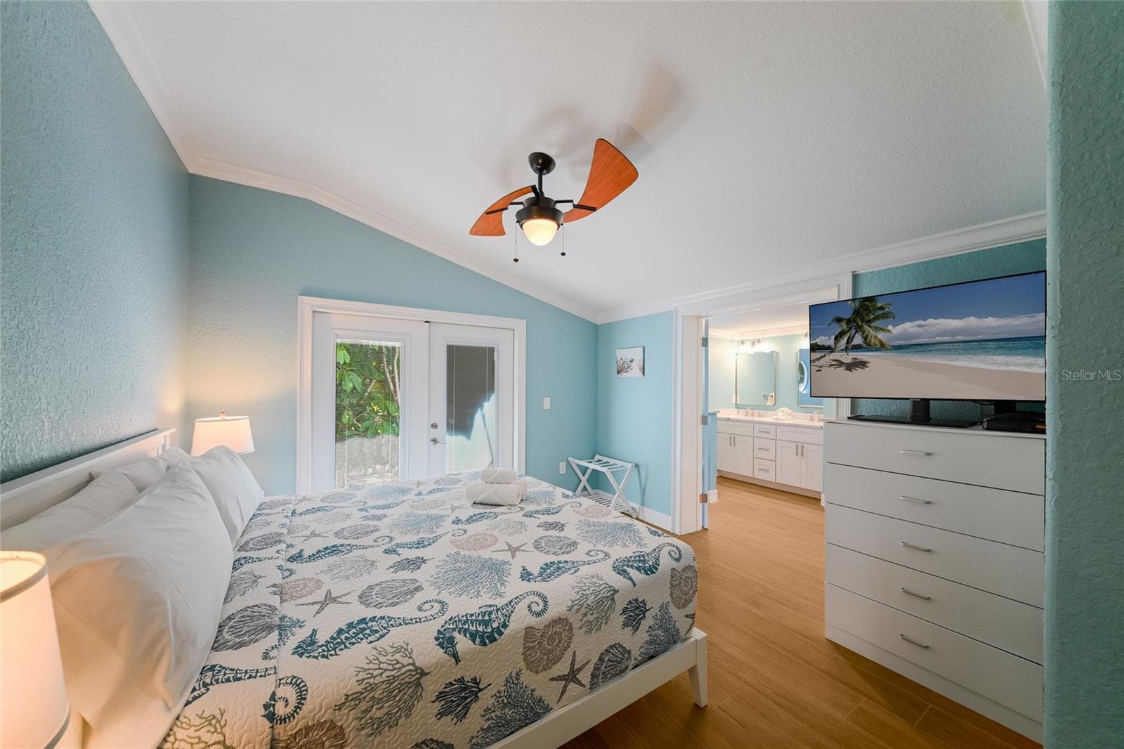 Primary suite w/ french doors to private patio off of the primary suite - 324 64TH ST, HOLMES BEACH