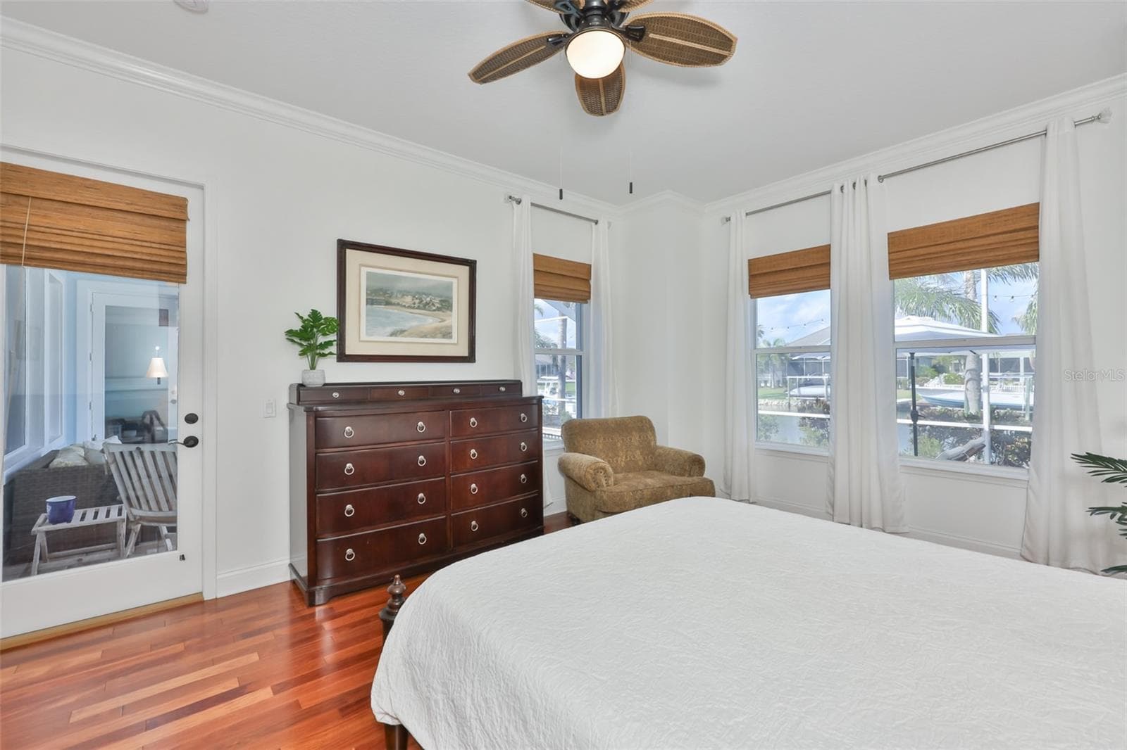 master bedroom with french door to the lanai - 5318 LOON NEST CT, APOLLO BEACH