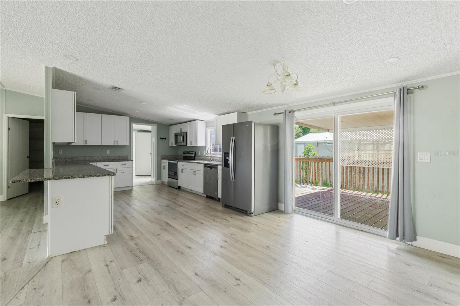 Kitchen with granite countertops - 3518 KIAH DR, WESLEY CHAPEL