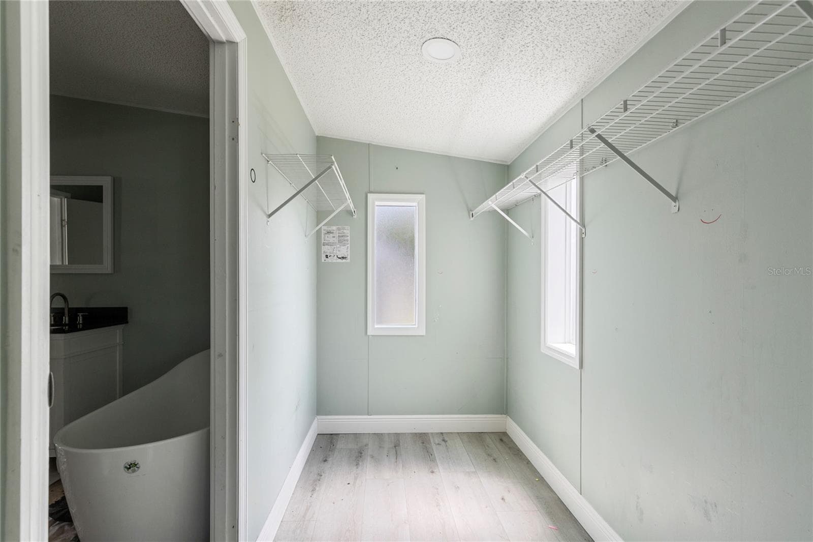 Primary Walk-In Closet - 3518 KIAH DR, WESLEY CHAPEL