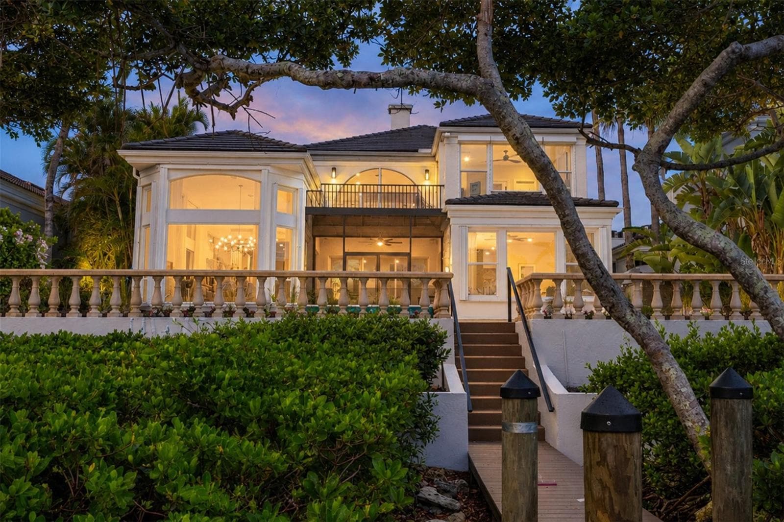 Back of the Home at Sunset - 3606 FAIR OAKS PL, LONGBOAT KEY