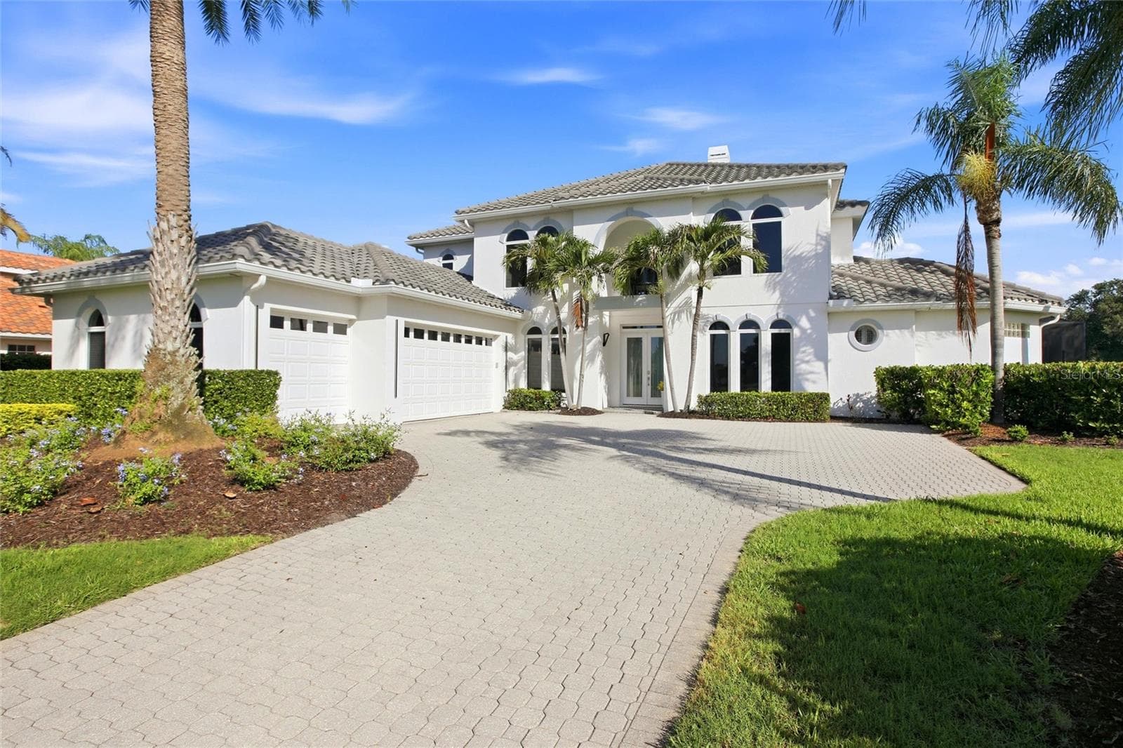 An extensive paver driveway off of the culdesac invites you to 8417 Lone Eagle Way. - 8417 LONE EAGLE WAY, SARASOTA