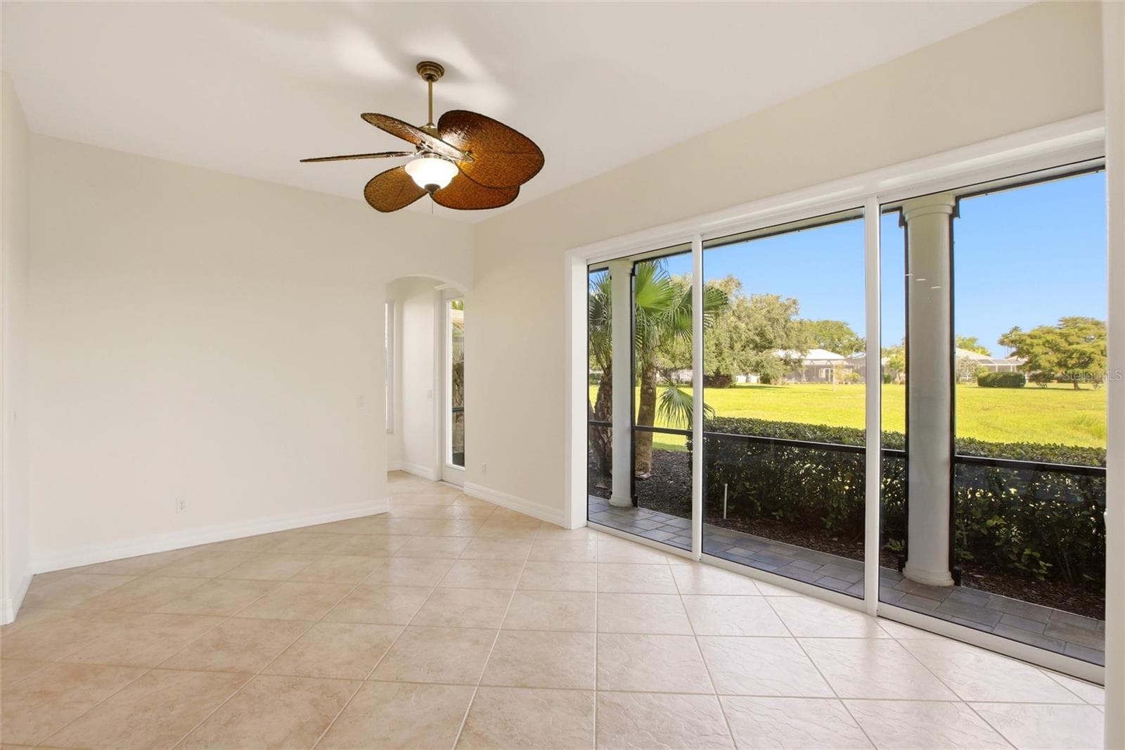 The kitchen offers an extensive breakfast bar and a comfortable casual dining area, along with generous counter space, dual sinks, double ovens, abundant cabinetry, and a spacious walk-in pantry. - 8417 LONE EAGLE WAY, SARASOTA